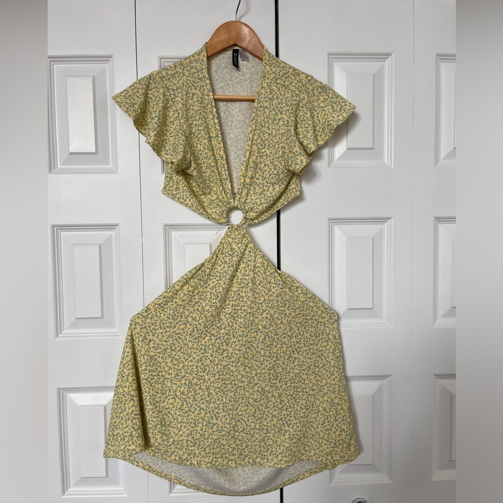 Cute summer dress for the beach. Shows some skin!